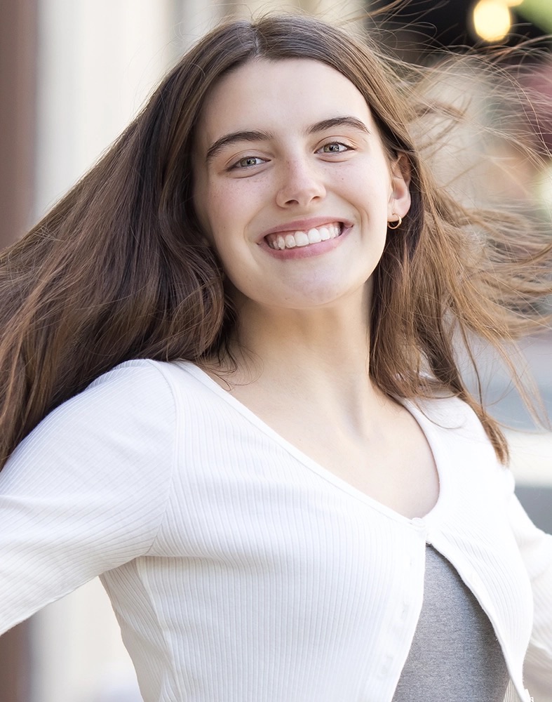 A happy Papasikos Orthodontics patient with a beautiful smile